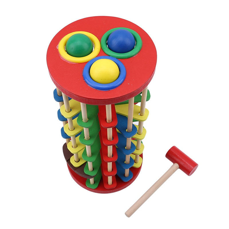 Pound And Roll Wooden Tower With Hammer Knock The Ball